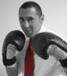07.28.14_Michael_Goldberg_Headshot_Boxing_Red_Tie_BW